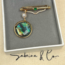 Hanging pearl and shell brooch