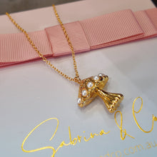 Gold mushroom necklace