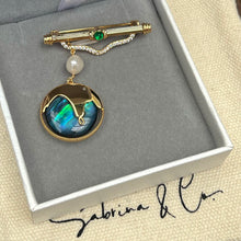 Hanging pearl and shell brooch