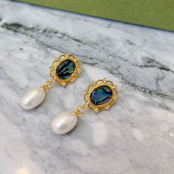 Abalone shell with hanging pearl earrings