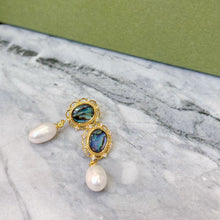 Abalone shell with hanging pearl earrings