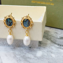 Abalone shell with hanging pearl earrings