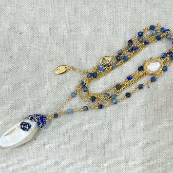 Aquamarine with hanging pearl necklace