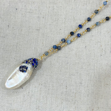 Aquamarine with hanging pearl necklace