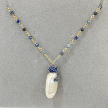 Aquamarine with hanging pearl necklace