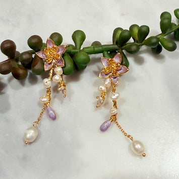 Flower with hanging pearl earrings