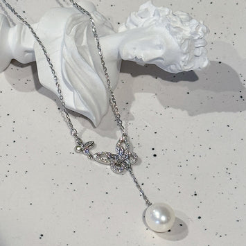 Sterling sliver butterfly with hanging pearl necklace