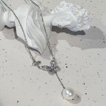 Sterling sliver butterfly with hanging pearl necklace