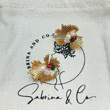 Pearl and gemstones designed earrings