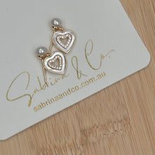 Pearl with hanging shell heart earrings