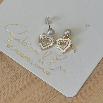 Pearl with hanging shell heart earrings