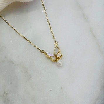 Shell butterfly with hanging pearl necklace