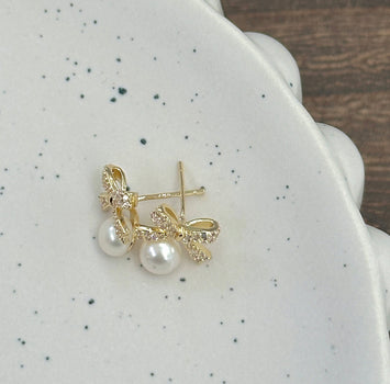 Golden bow earrings
