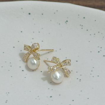 Golden bow earrings