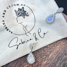 Sliver shell drop earrings