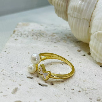 Shell butterfly with double pearl ring