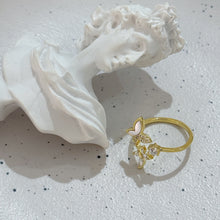 Triple butterfly ring
