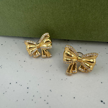 Golden bow earrings