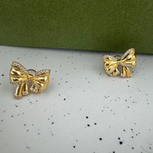 Golden bow earrings