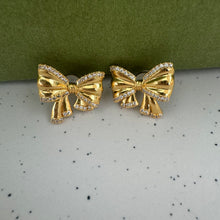 Golden bow earrings