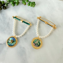 Hanging pearl and shell brooch