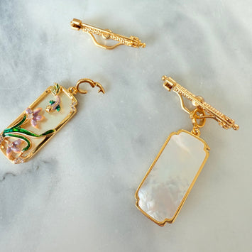 Hanging purple flower brooch