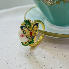 Pearl with golden butterfly ring