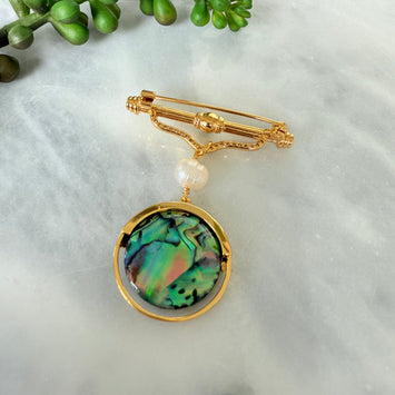 Pearl hanging shell brooch