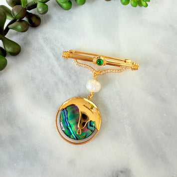 Pearl hanging shell brooch