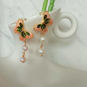 Pink butterfly with hanging pearl earrings