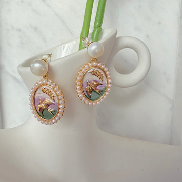 Pearl with hanging bird painting earrings