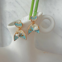 Tail earrings