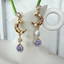 Hanging space earrings