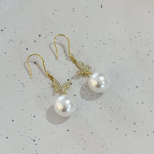 Hanging butterfly pearl earrings
