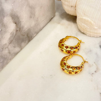 Carved star hoop earrings