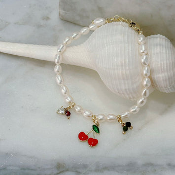 Pearl with hanging cherry bracelet