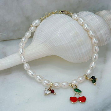 Pearl with hanging cherry bracelet