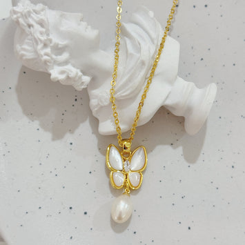 Shell butterfly with pearl necklace