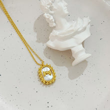 Shell bow necklace