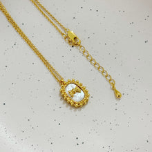Shell bow necklace