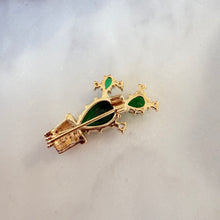 Small brooches