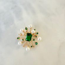 Small brooches
