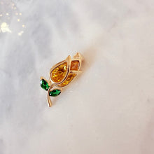 Small brooches