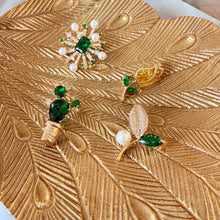 Small brooches