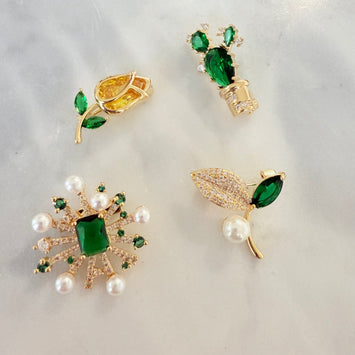 Small brooches