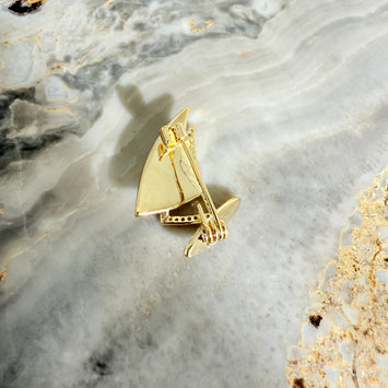 Shell sailboat brooch