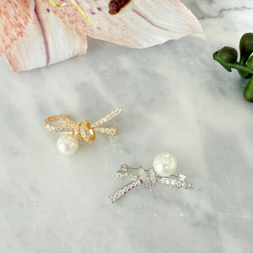 Pearl bow brooch