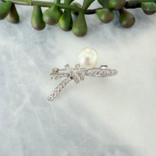 Pearl bow brooch