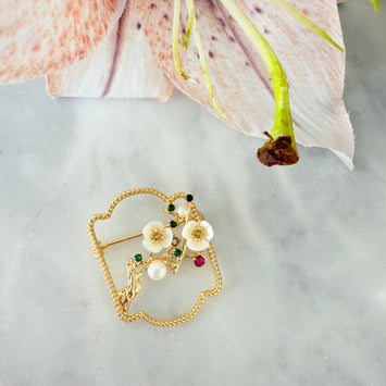 Carved spring brooch