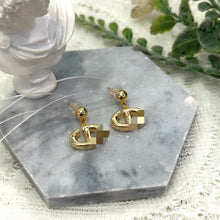 Golden letter CD earrings
